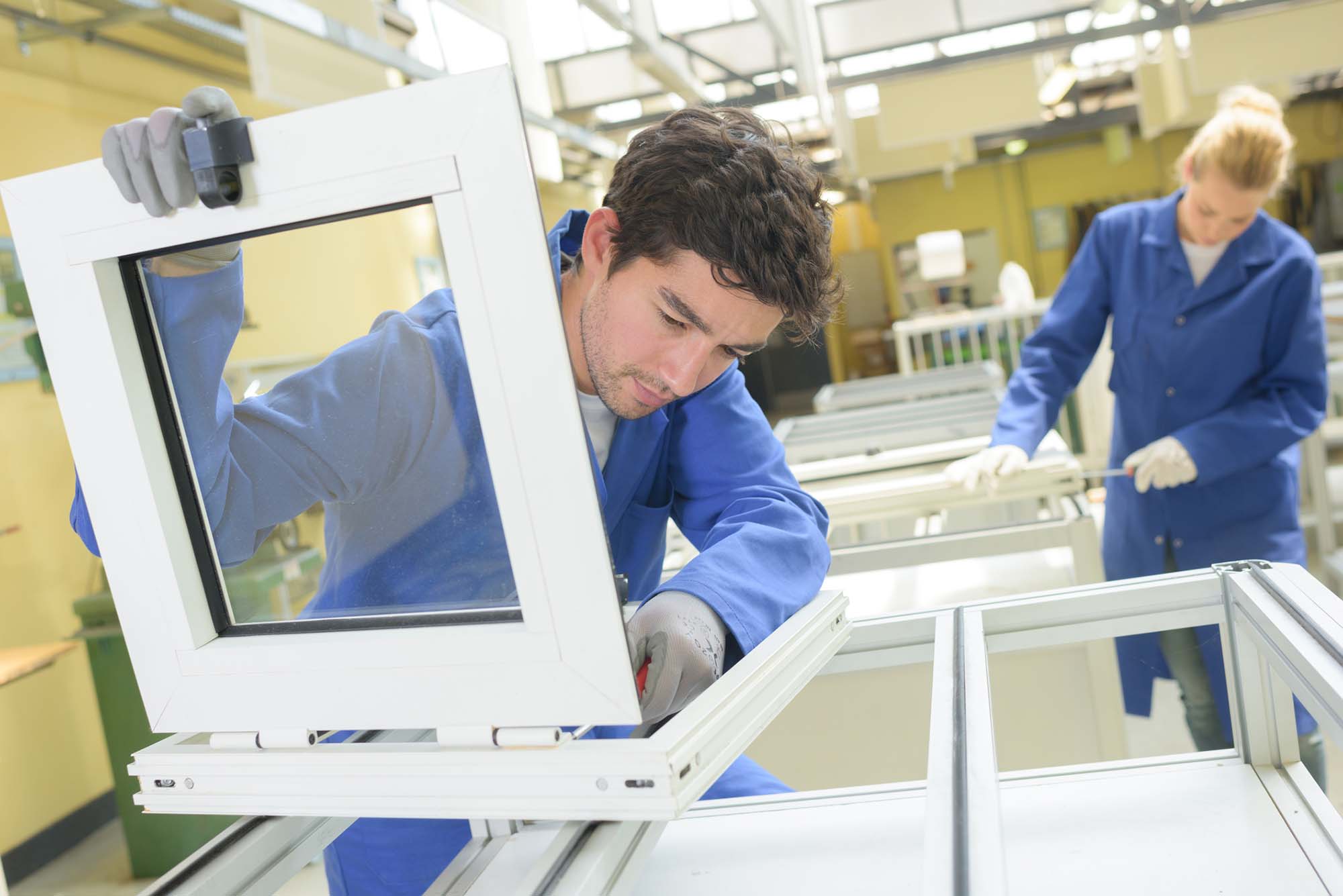 Man making pvc window production